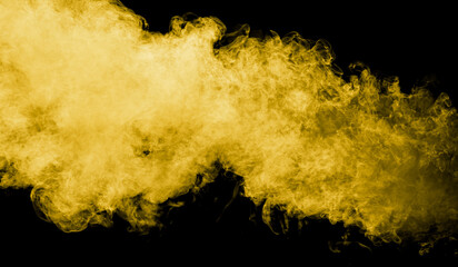 Yellow smoke isolated black background