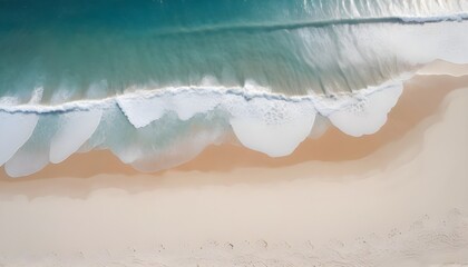 Sea and beach aerial view, Top view, amazing nature background. A beautiful strip of white sand surrounded by crystal clear water. Aerial view of the sandy beach near the sea with waves.