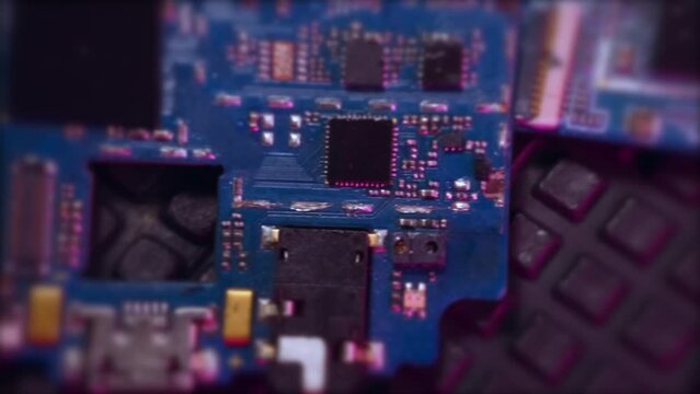 Surface of microchips rotating blurred background. PC chip, cpu, circuits. PCB, printed wiring board.  Technology robotics.