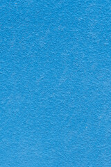 Blue cement wall texture for background and copy space for text.