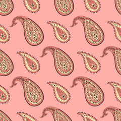 Colorful seamless pattern with yellow Paisley motifs on pink background. Traditional indian repeat design.