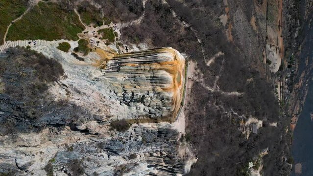 Hierve el Agua, vertical drone shot of thermal spring waterfall in the Valleys of Oaxaca, Mexico,