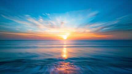 Fototapeta na wymiar Sunset over the ocean with vibrant colors
