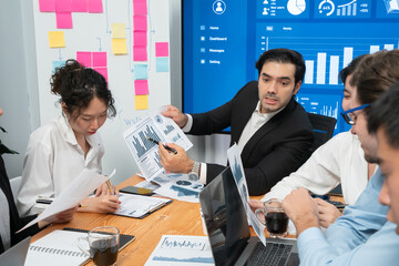 Diverse group of business analyst team analyzing financial data report. Finance data analysis chart...