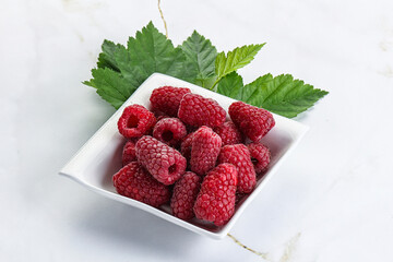 Rope sweet juicy raspberry heap