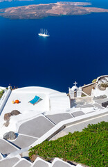 house and stair street leading to the sea. with views to caldera in Santorini Island, Greece. Landscape Greek islands