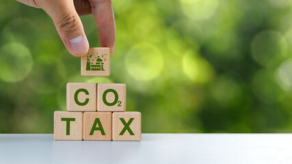 Concept of green Co2 tax, carbon tax, environmental and social responsibility. Taxation for Natural...