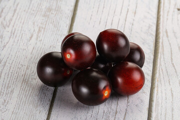Raw ripe black kumato tomato