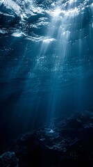 Underwater scene with sunbeams filtering through water