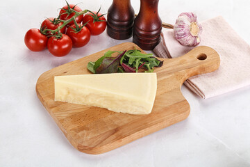 Piece Italian hard parmesan cheese