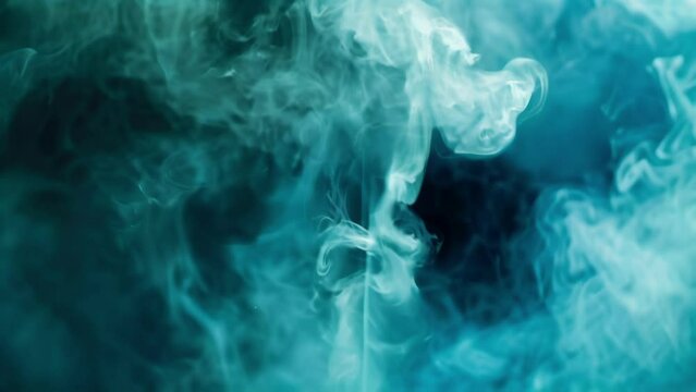 Rich shades of blue and green intermingle in this ethereal and trippy smoke footage.