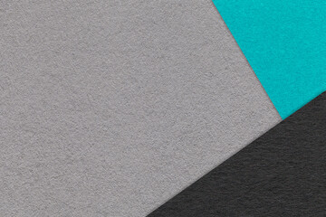 Texture of craft gray color paper background with black and turquoise border. Vintage abstract grey...