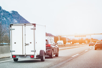 A Car and a Trailer for Your Adventure Trip. Move Your Stuff with Ease - obrazy, fototapety, plakaty