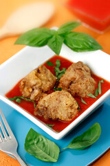 Homemade meatballs with tomato sauce.