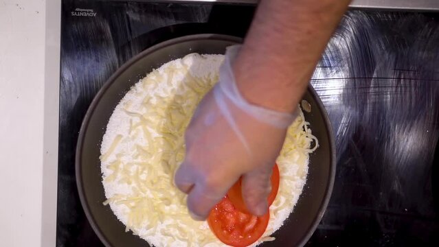 Slow motion view of adding tapioca flour to cook sandwich