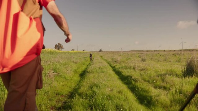 Two Men and Dog Hunting Hunt Pheasant Bird with Gun Riffle Shotgun