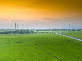 view of turbine green energy electricity, windmill for electric power production, Wind turbines generating electricity on rice field at Phan Rang, Ninh Thuan province, Vietnam