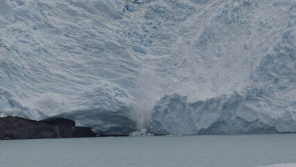 Glacial Calving Event Capturing Ice Falling into Ocean