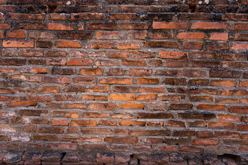Close up vintage red and brown brick wall background. Grunge background.