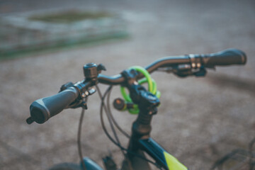 Bike handlebar, close up of bicycle on the street