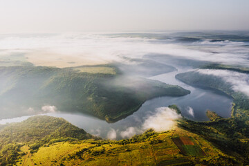 Gorgeous view from a drone flying over the winding Dniester river. Ukraine, Europe.