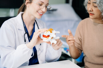 Portrait of female doctor explaining diagnosis to her patient. Doctor Meeting With Patient In Exam Room. A medical practitioner reassuring a patient