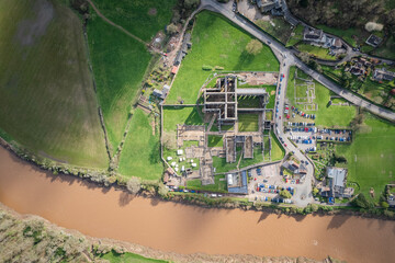 Amazing aerial top down view of Tintern Abbey, River Wye, and the nearby landscape.