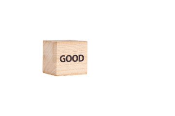 wooden cubes with the inscription Good on a white isolated background close-up