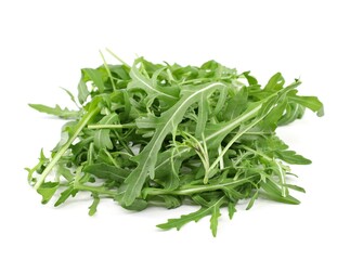 Heap of rocket salad  leaves on white background.