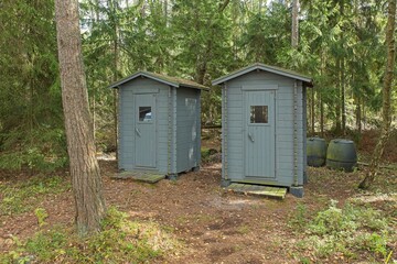 Public outhouses on the island of Käärmesaari in summer, Espoo, Finland.