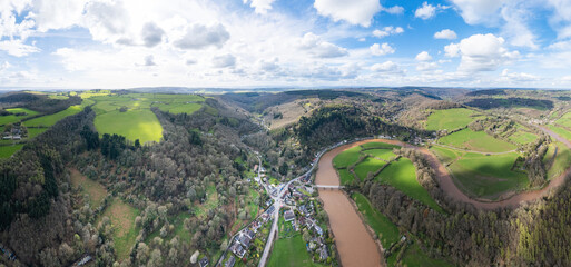 Amazing aerial panorama of Tintern Abbey, River Wye, and the nearby landscape.