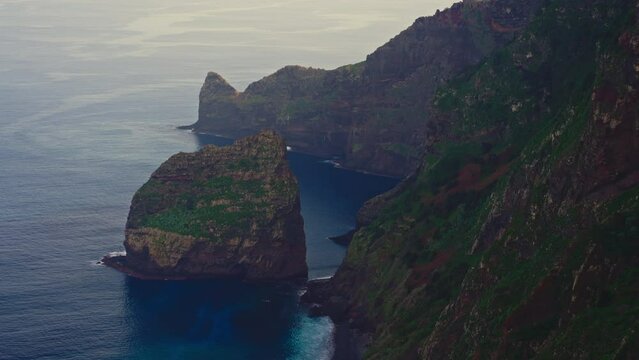 The Ilheus da rib arch, on the coastline of Ribeira da Janela at sunset in Madeira, Portugal