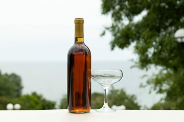Glass With Bottle Alcoholic Drink Background Sea