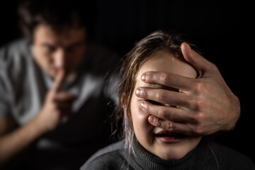 Child, domestic violence and depression with hand on mouth for silence, abuse and sad in relationship. - obrazy, fototapety, plakaty
