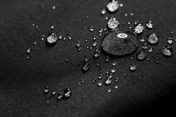Many water drops on waterproof impregnated fabric