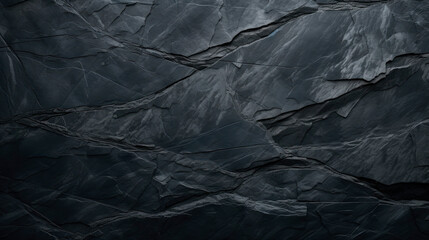 A close-up of a black rock wall with a blue line