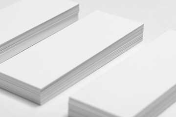 Photo of business cards. Template for branding identity. For graphic designers presentations and portfolios .Blank business cards on white background. Mockup for branding identity.