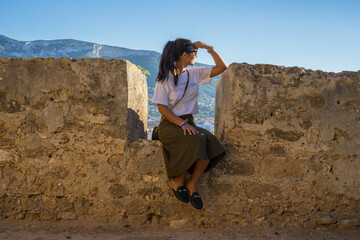 young woman looking away in the countryside
