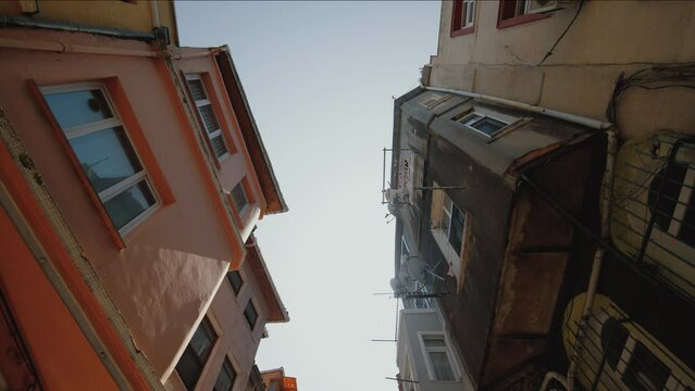 Facade of colored houses in Balat area of Istanbul, Turkey, popular tourist place. Jewish quarter, Kiremit Street, historical and touristic area with old buildings, Travel, tourism concept