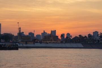 Fototapeta na wymiar Sunset on Tonle Sap River, Mekong River in Phnom Penh City, Cambodia