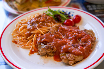 Delicious tomato pork chop with pasta in Hong Kong tea restaurant