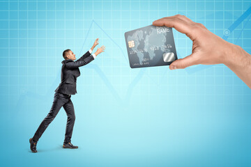 Businessman aspiring to the offer of a credit card