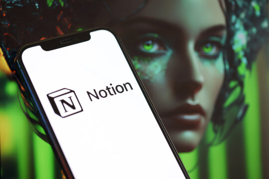 KYIV, UKRAINE - MARCH 17, 2024 Notion logo on iPhone display screen with background of artificial intelligence futuristic ai generated image close up