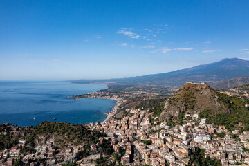 The hilltop town of Taormina with Mt Etna in the background