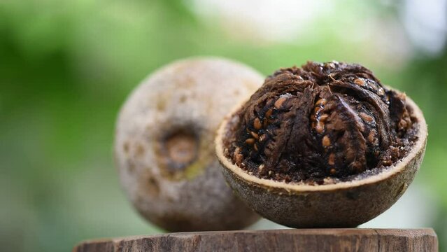 Elephant apple or Limonia acidissima fruits on natural background.
