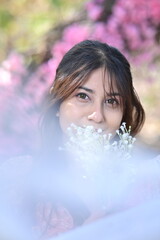 portrait of a woman with flowers. Flowers and beautiful woman. garden. spring time. happiness and freshness. 