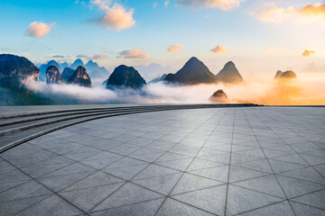 Empty square floor and beautiful mountain with clouds natural landscape at sunrise - obrazy, fototapety, plakaty