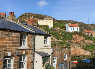 Village houses on a hillside in Staithes, Yorkshire, UK