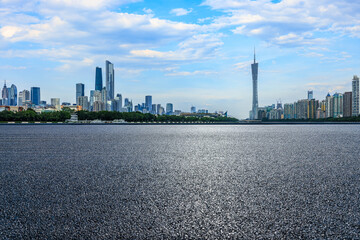 Asphalt road and city skyline with modern buildings scenery in Guangzhou - obrazy, fototapety, plakaty