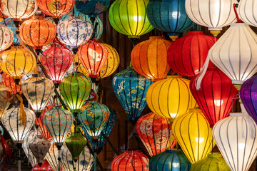 Colorful lanterns spread light on the old street of Hoi An Ancient Town, Vietnam